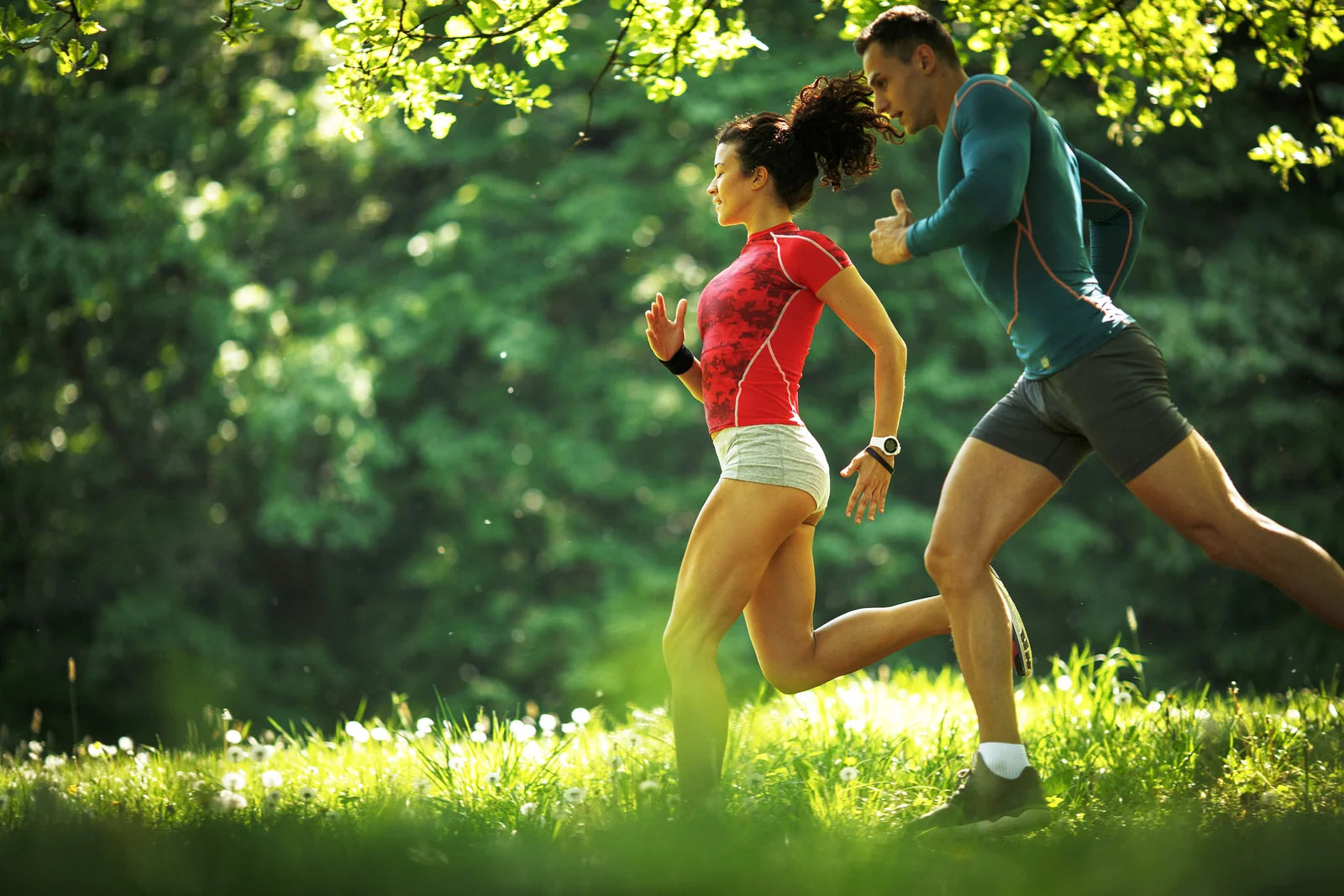 Couple running in park